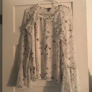 Ruffled blouse with long bell sleeve